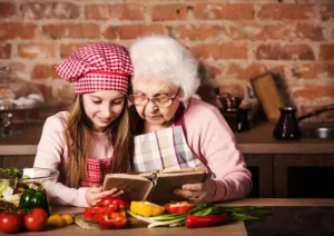 receitas tradicionais - neta e avó cozinhando