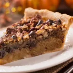 Torta de Nozes com chocolate Com Base Amanteigada e Doce de Leite no Recheio