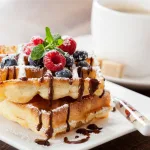 Descubra a receita de waffle doce perfeita! Leve, crocante e pronta em minutos, essa delícia combina com mel, chocolate e frutas. Experimente agora!